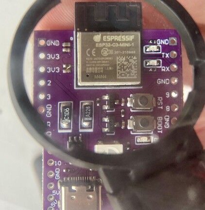 ESP32 C3 MINI-1 (chipset seen through magnifying glass
