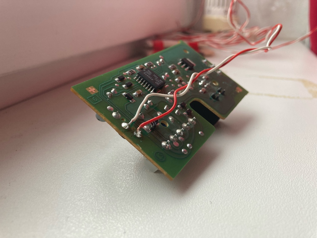 wires soldered to the contacts for the buzzer button